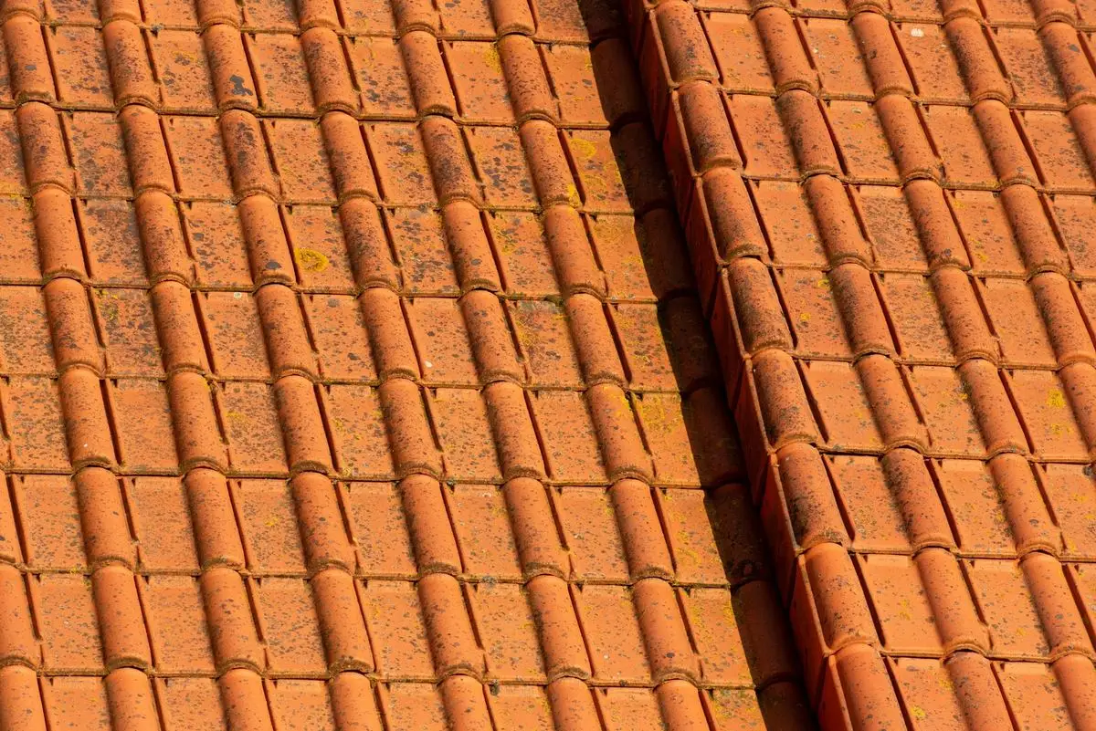 Orange terracotta roof tiles in rows